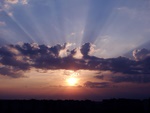 Stormy cloud with sun rays