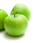 The ripe juicy apples covered by drops of water. Isolation on white, shallow DOF.